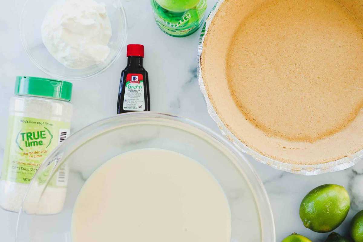 Ingredients for key lime pie sit on the counter.