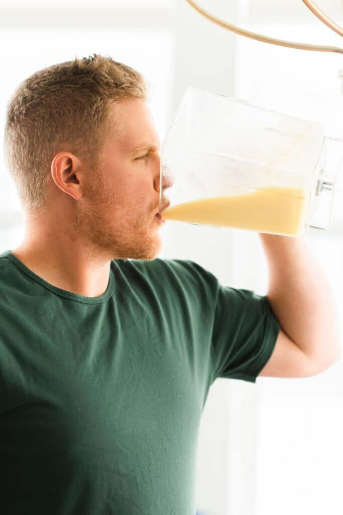 Dallin, a man, drinks his Orange Julius straight from the blender. 