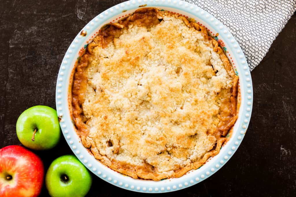 Looking down on a golden brown perfectly cooked Dutch Apple Pie.