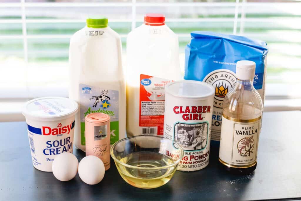 Ingredients for buttermilk waffles sit on countertop.