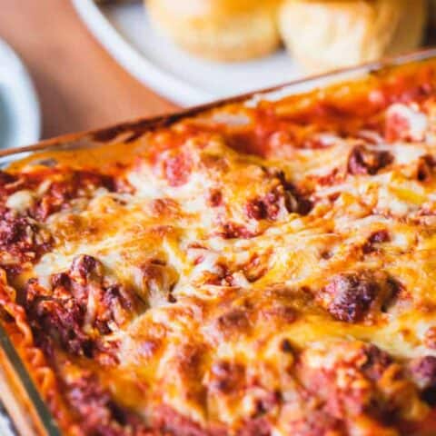 Hot from the oven a pan of cooked lasagna sits cooling.