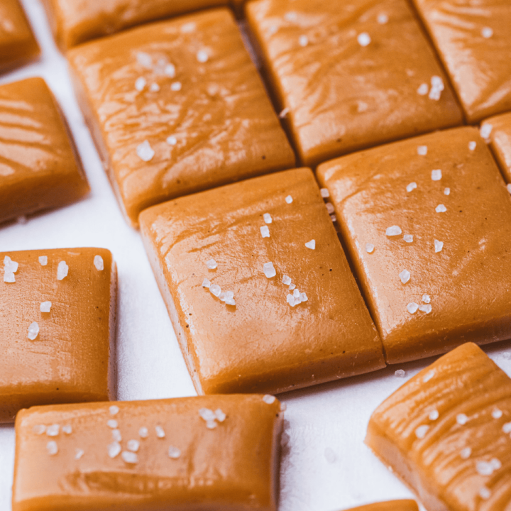 Cut pieces of salted cinnamon caramel are topped with flaky sea salt.